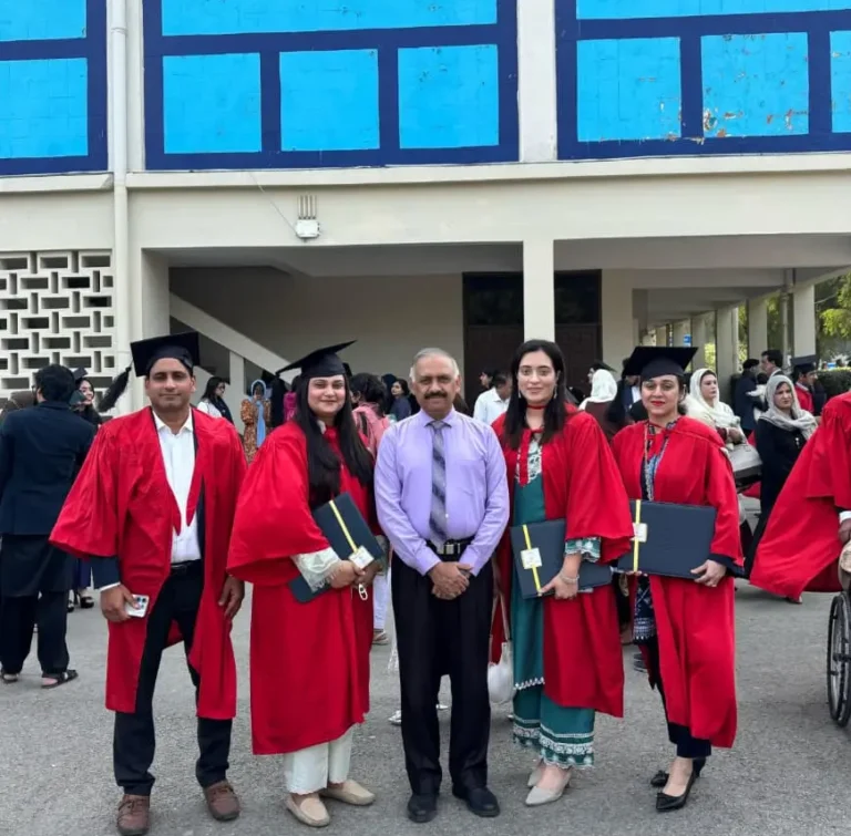 Dr. Muhammad Ihsan Ullah celebrating his PhD degree at the University of the Punjab, Lahore, with his dean and class fellows